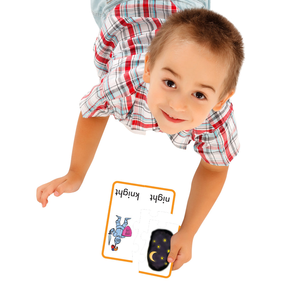 boy playing with Junior Leanring JL243 Homonym Puzzles