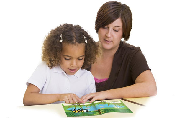 teacher and student reading Junior Learning JL380 Letters and Sounds Phase 1 Set 1 Fiction