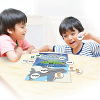 Boys playing Junior Learning JL401 Aliens VS Earthlings board game