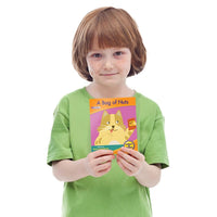 kid holding Junior Learning JL381 Letters & Sounds Phase 2 Set 1 Fiction