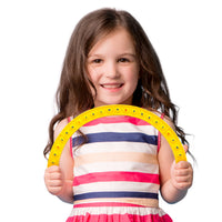 girl holding Junior Learning JL681 Alphabet Arc Bubble Board